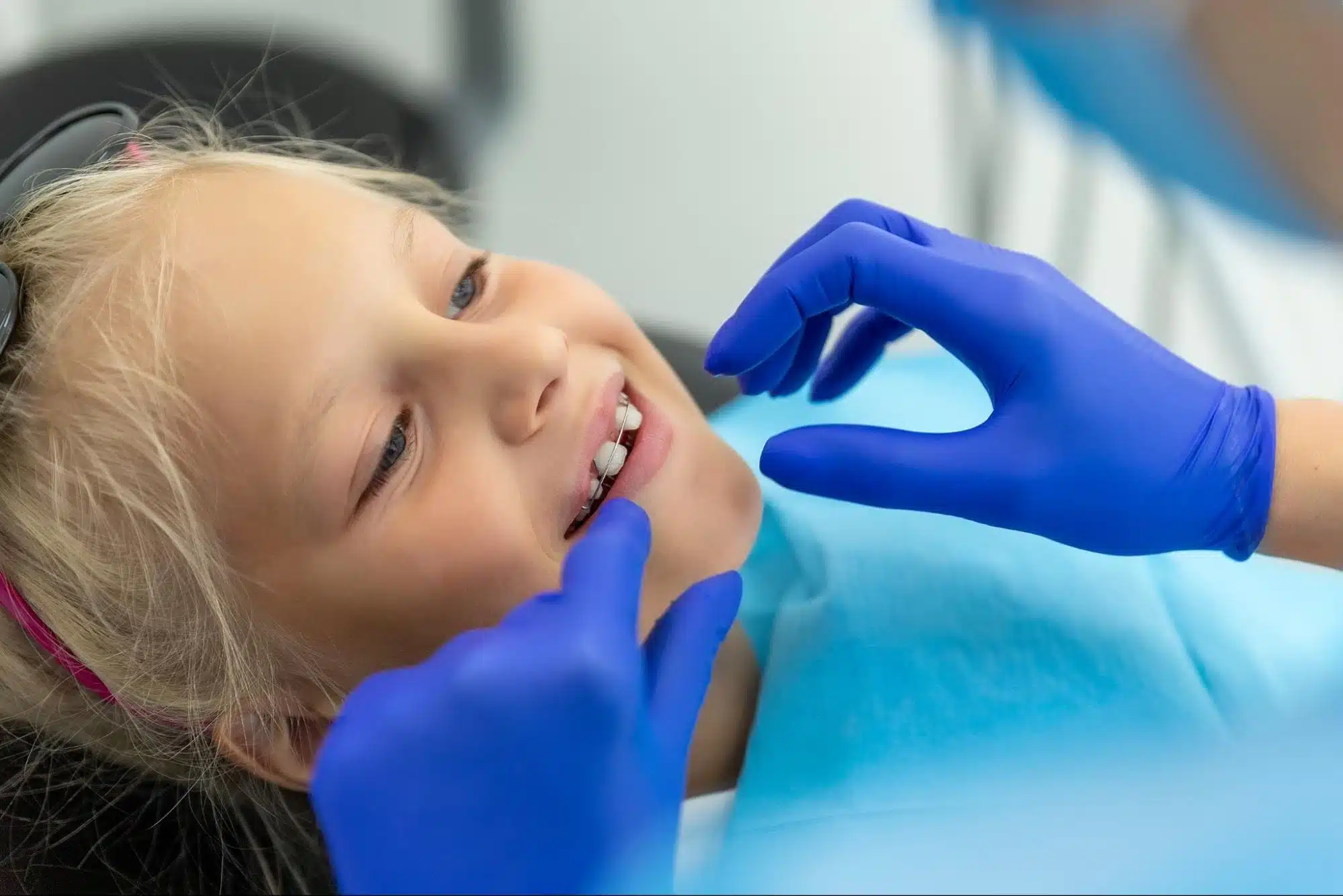 Child smiling with braces